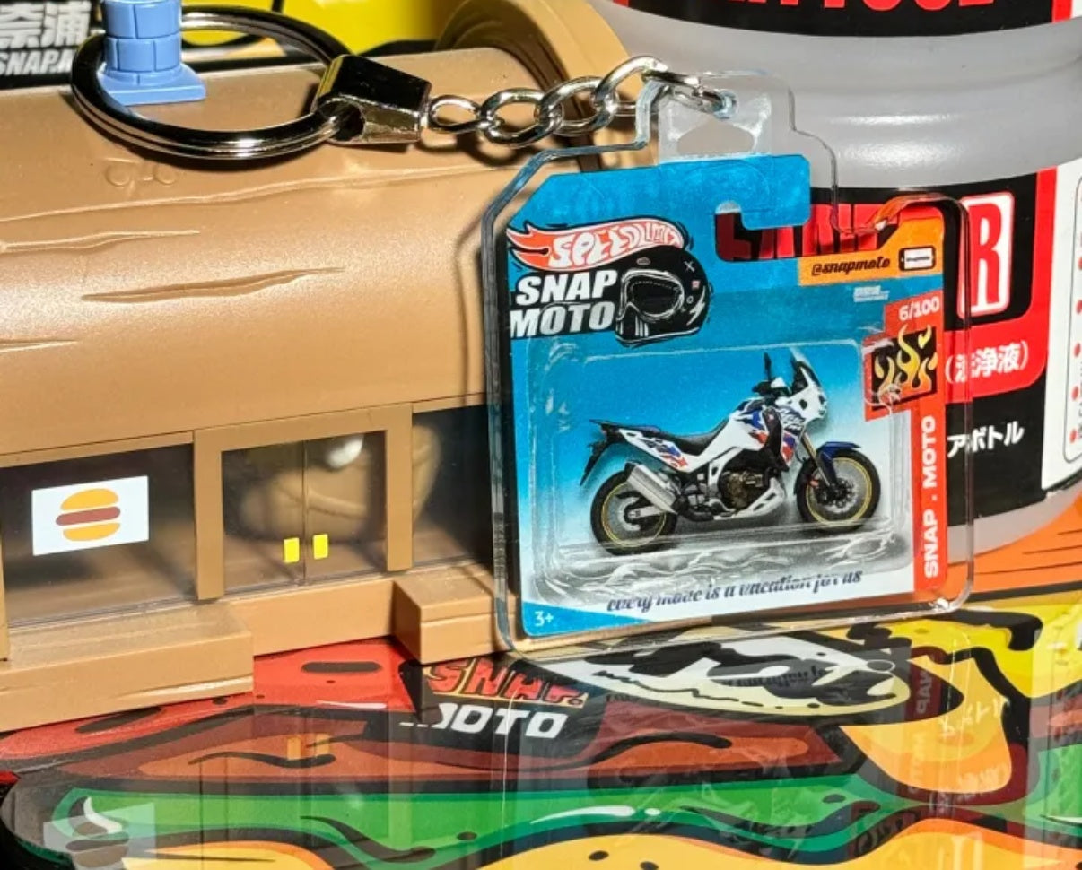 The Pocket Garage: 1:64 Scale Blister Pack Key Tag Keychain for Honda AfricaTwin